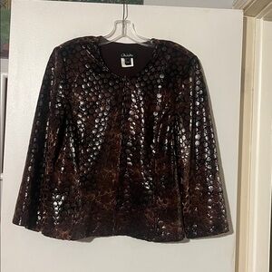 Nueva brown zip front collarless jacket.